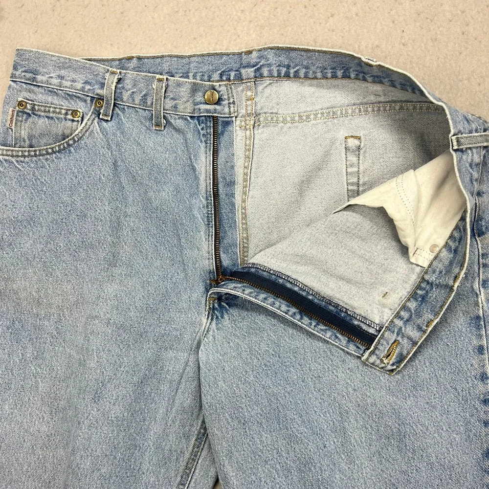 Vintage Carhartt Mens Relaxed Fit Tapered Leg Jeans Light Wash Blue 44x32